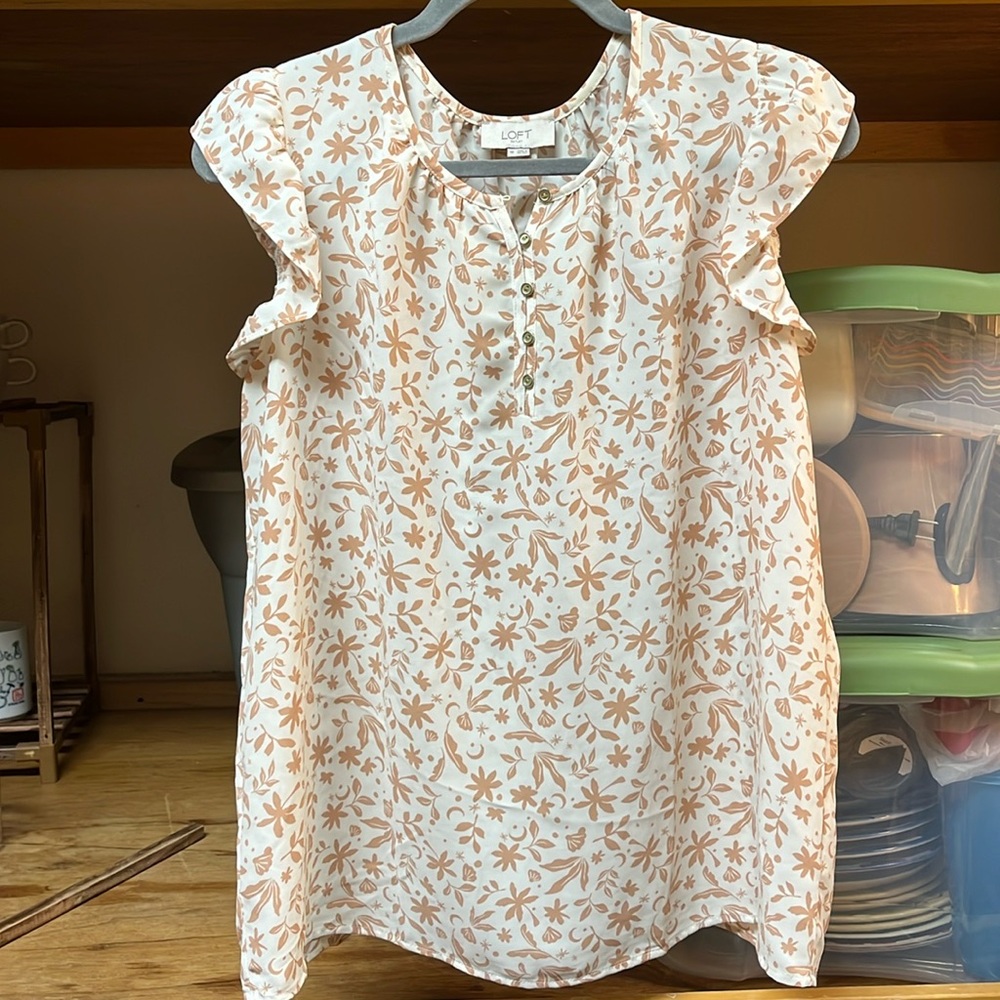 Super short sleeve blouse from Loft. White with leaf pattern. Medium. Used.